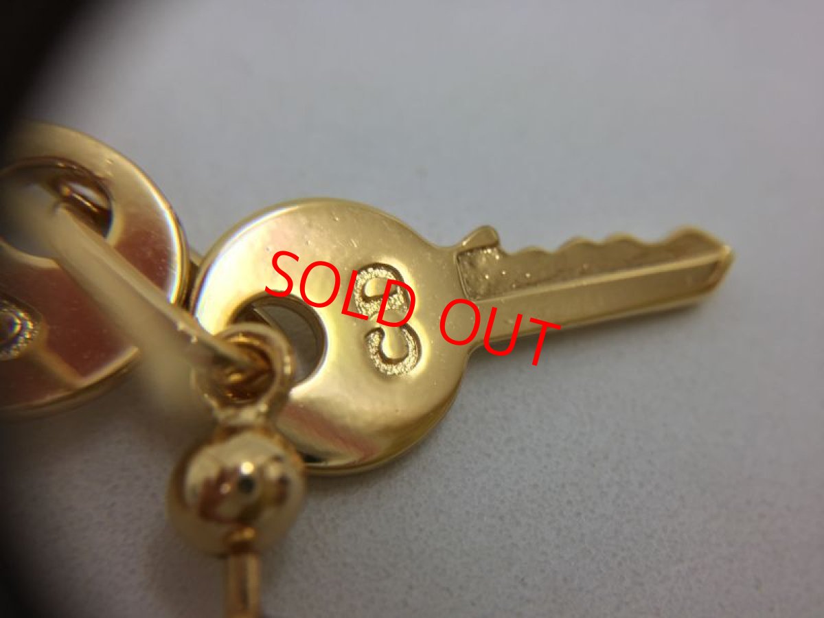 Photo9: Auth Dior Gold tone Shooting Star & Key motif L Piercing Earrings 1A260300n" (9)