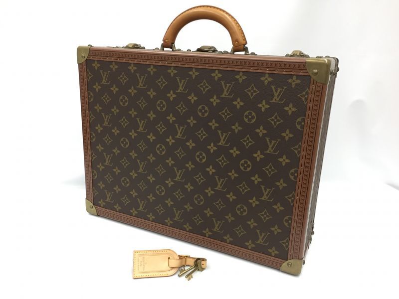 Vintage Louis Vuitton hard suitcase